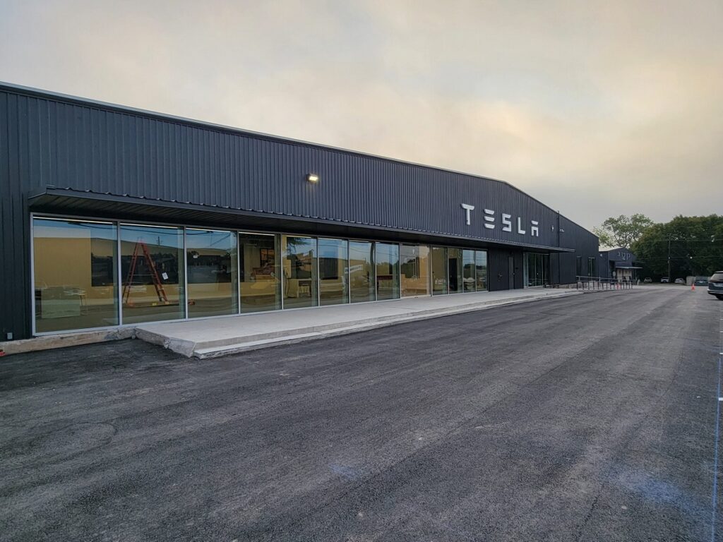 tesla storefront with large glass windows